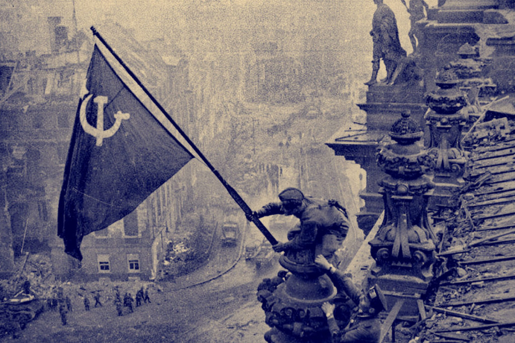 The iconic "Raising a flag over the Reichstag" photo by Yevgeny Khaldei